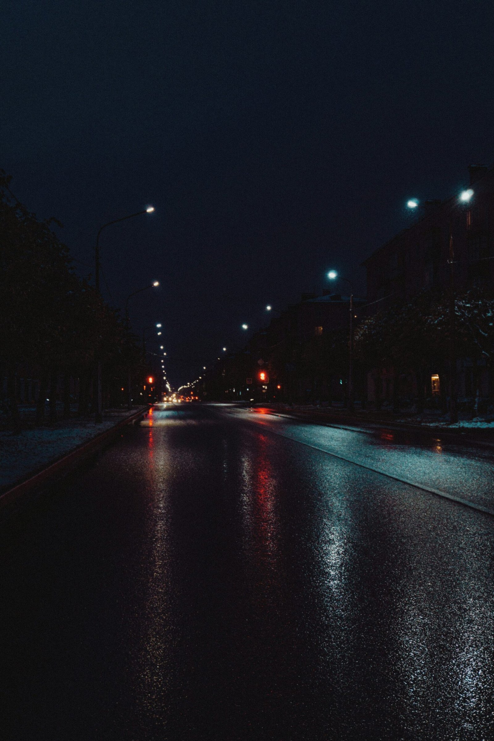 wet asphalt road at night